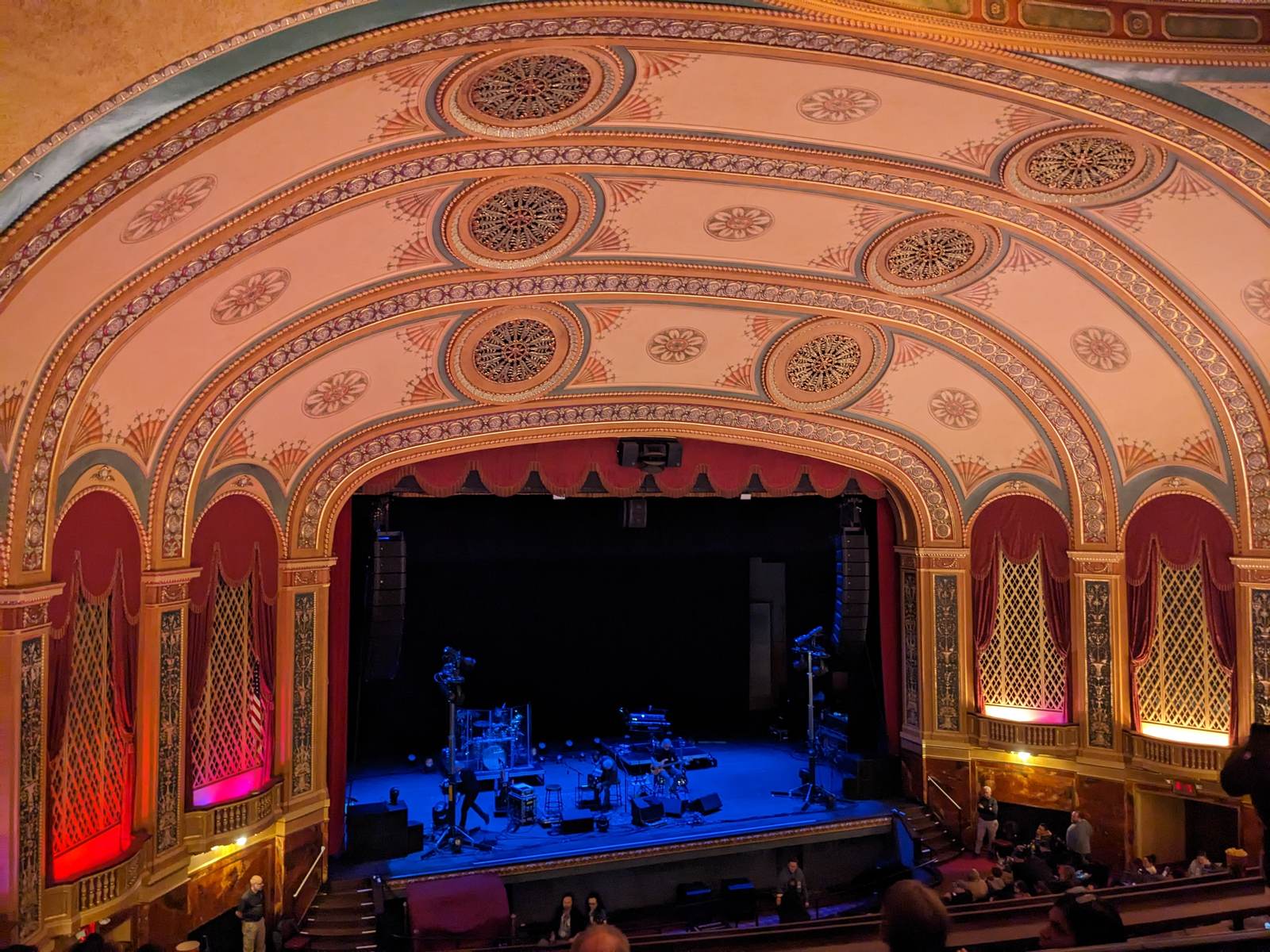 Auditorium interior with rows of seats facing the stage