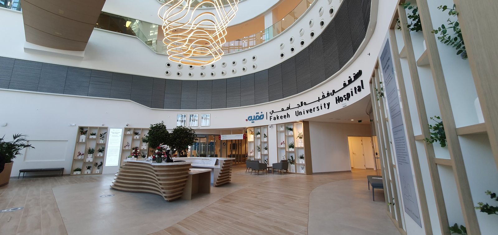 Modern hospital corridor with clean, quiet finishes
