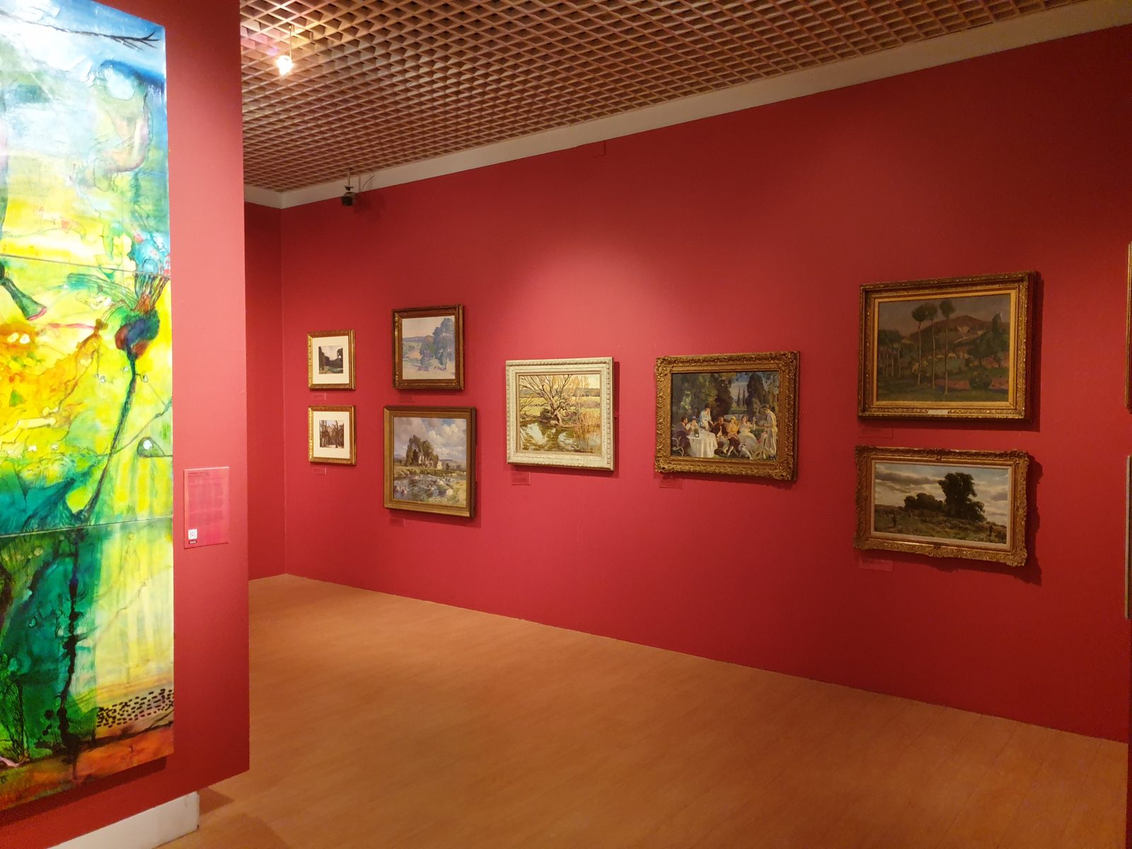 Museum gallery interior with artwork on display